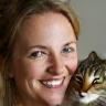 Charlotte smiling with cat Milo